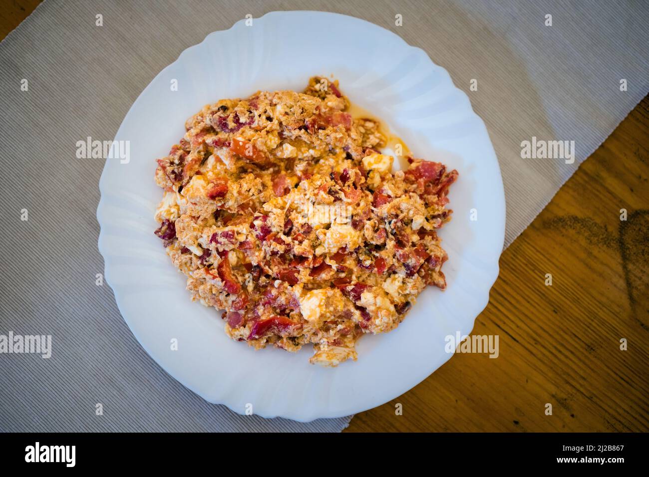 Delicious colorful vegetarian local food mish mash, eggs in a