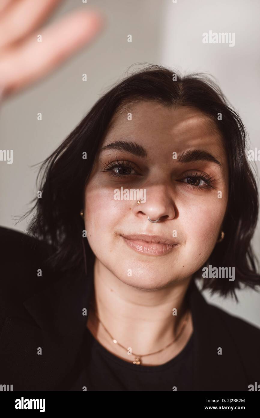 Portrait of young woman in studio Stock Photo