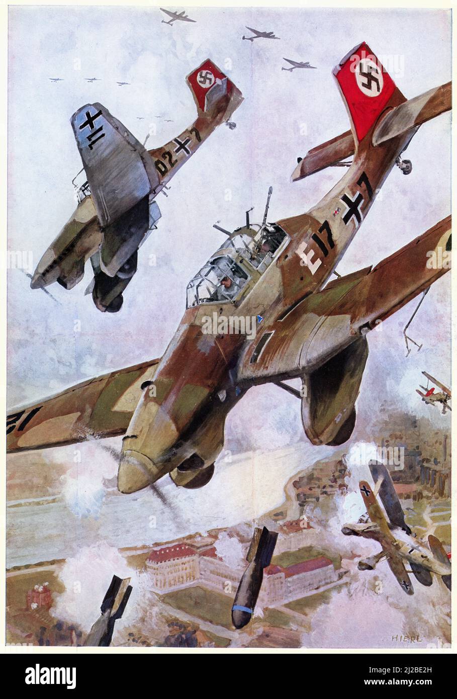 German Luftwaffe's Junkers Ju 87 or Stuka dive bomber ground attack warplane dropping bombs, Spanish Civil War 1938 Stock Photo