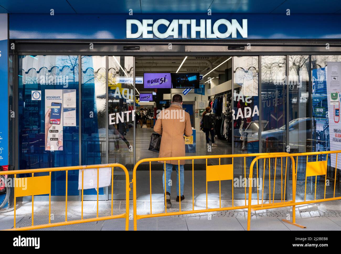 A pedestrian walks past the French sporting goods Decathlon store in Spain.  (Photo by Xavi Lopez / SOPA Images/Sipa USA Stock Photo - Alamy