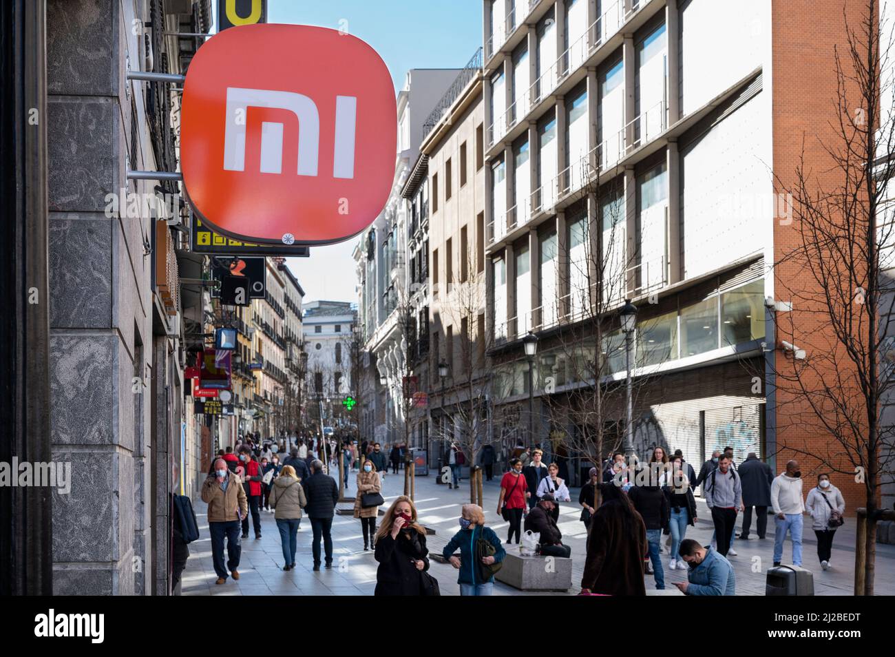 Madrid, Spain. 28th Mar, 2022. Pedestrians walk past the Chinese