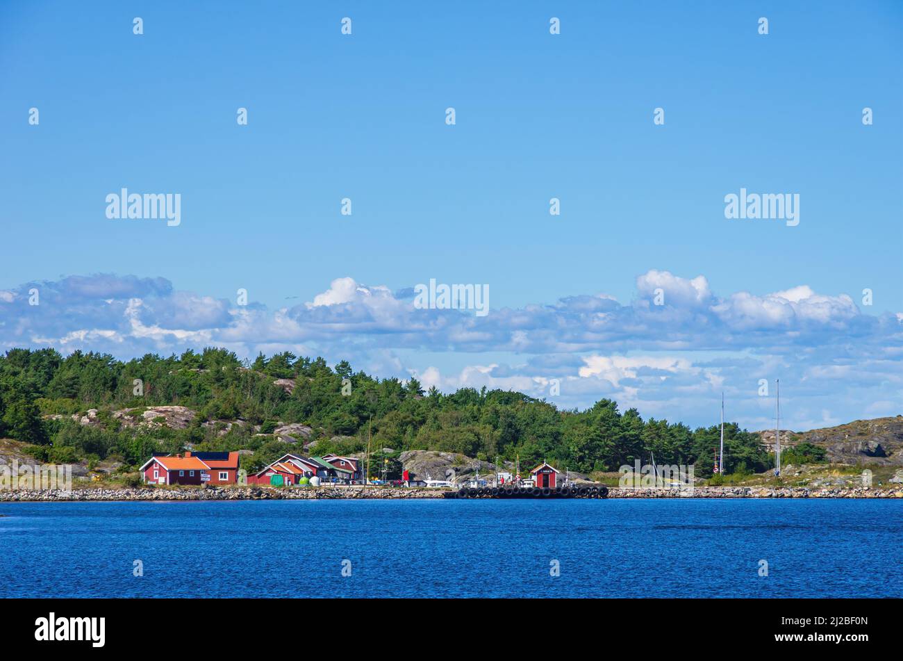 Picturesque coastal landscape with marina, South coast of North Koster Island, Bohuslän, Västra Götalands län, Sweden. Stock Photo
