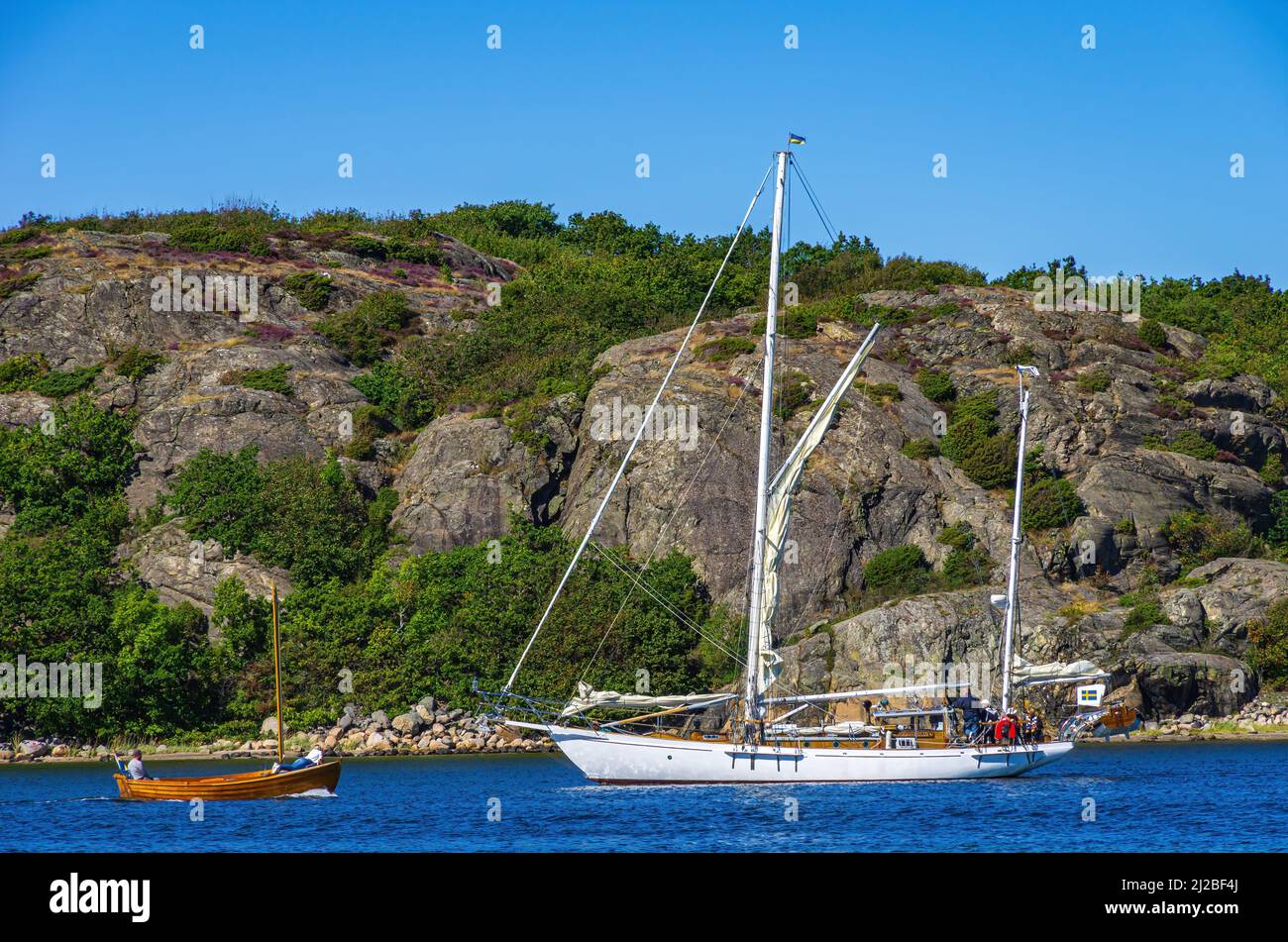 Picturesque coastal landscape with boat traffic, South coast of North Koster Island, Bohuslän, Västra Götalands län, Sweden. Stock Photo