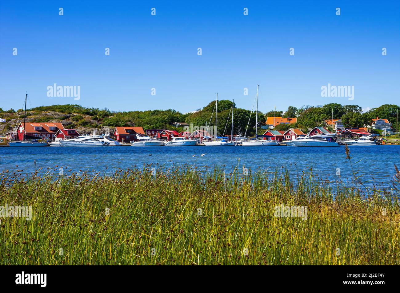 Picturesque coastal landscape of maritime structures and the sound between the islands of South and North Koster, Bohuslän, Sweden. Stock Photo