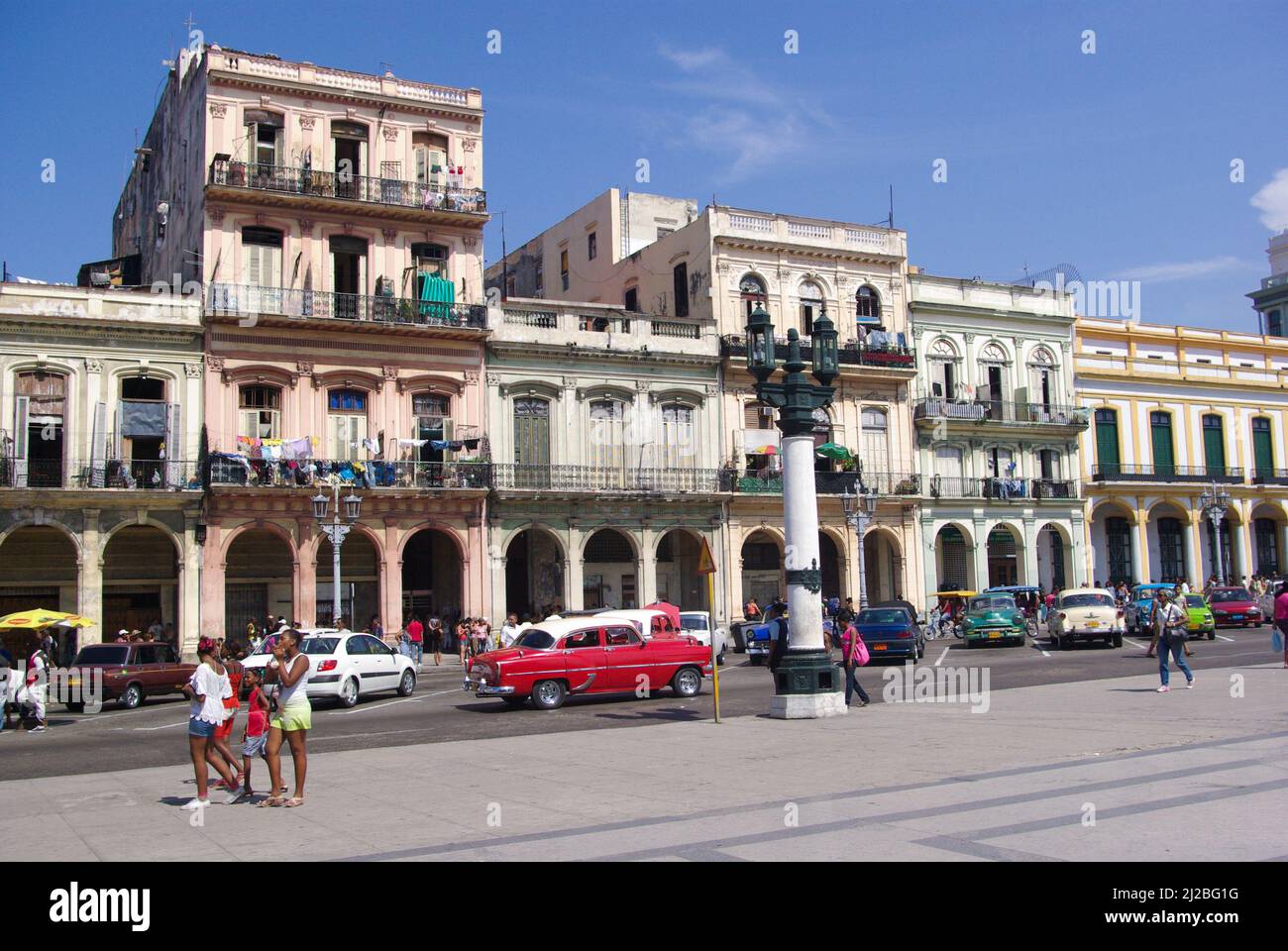 Havana, Cuba, April 10, 2010. typical atmosphere of Havana with its architecture and its old American cars Stock Photo