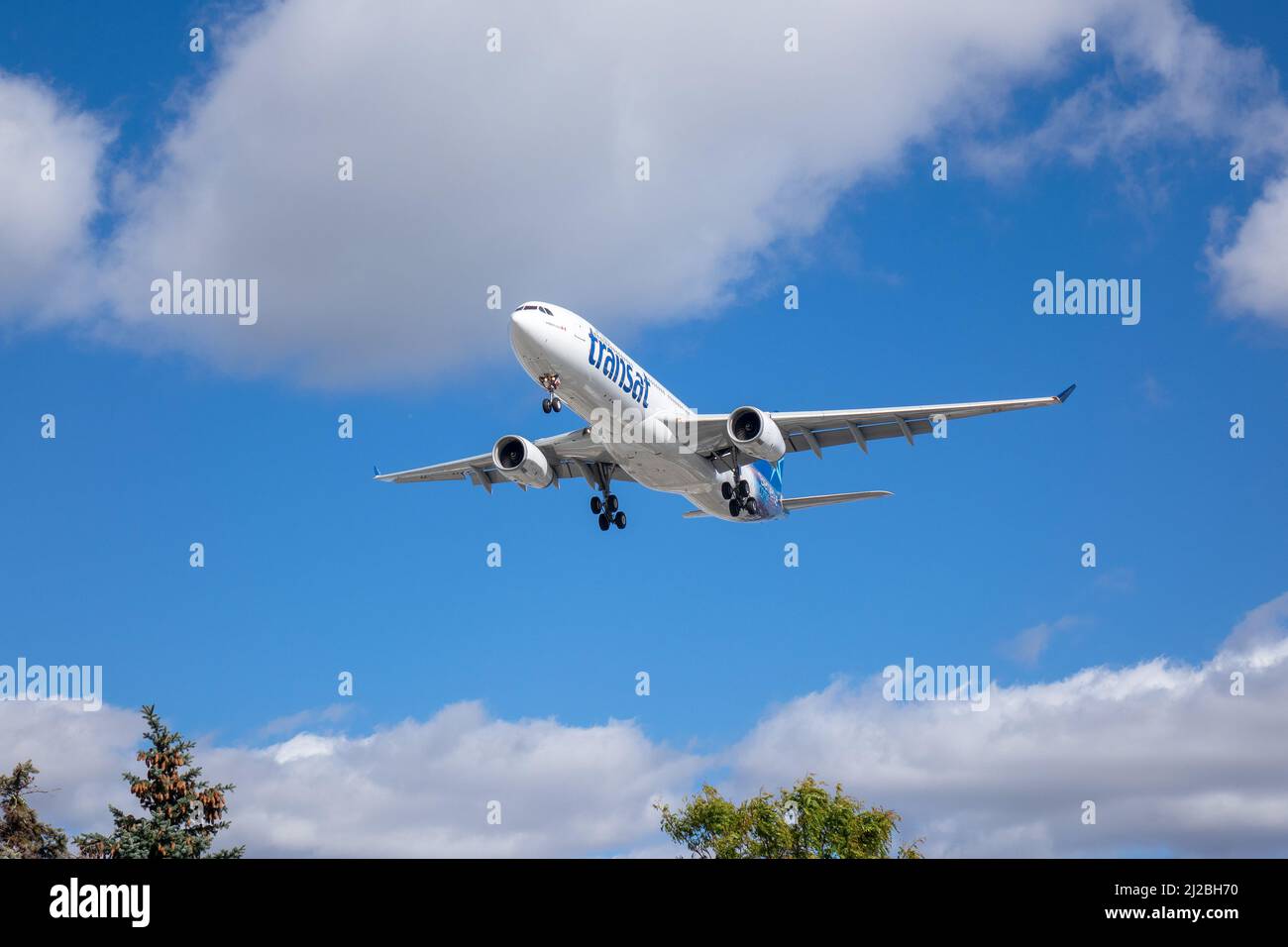 Canadian Airline Air Transat Airbus A3210 Landing At Lester B. Pearson International Airport, known as Toronto Pearson International Airport Canada Stock Photo