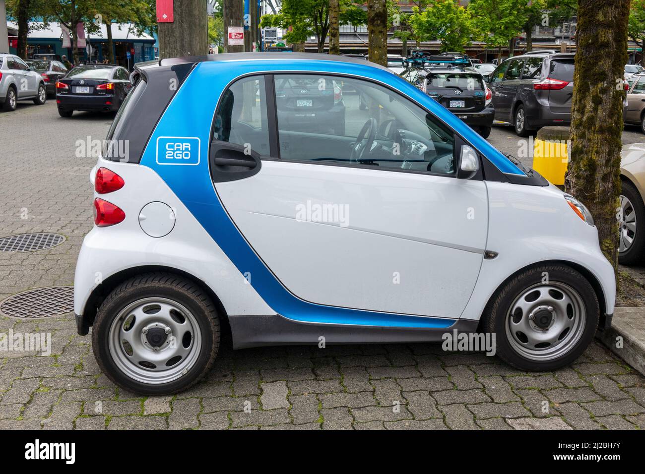 Car2Go Ride Sharing Smart Car Parked In Vancouver Canada Stock Photo