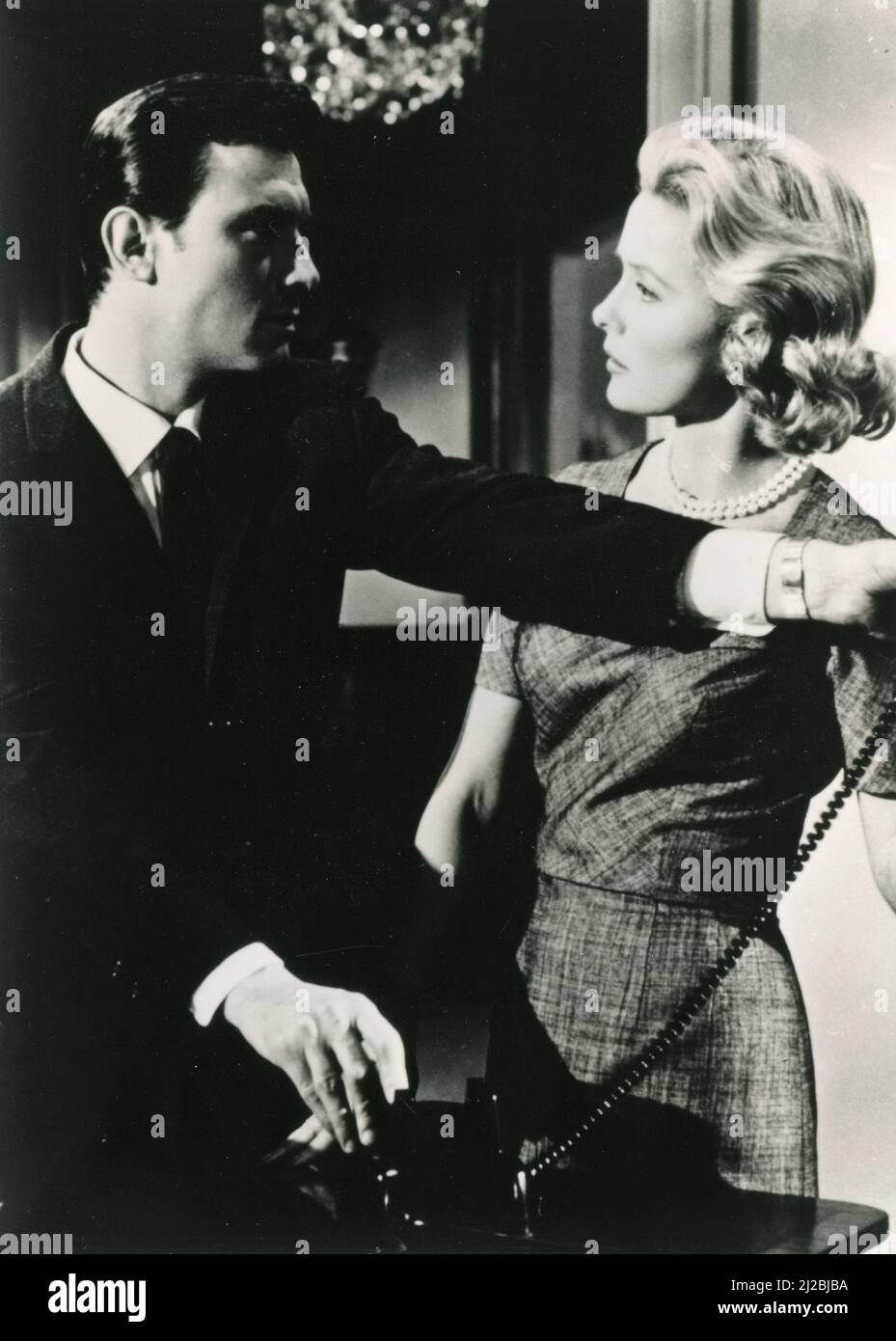 American actor Laurence Harvey and actress Dina Merrill in the movie ...