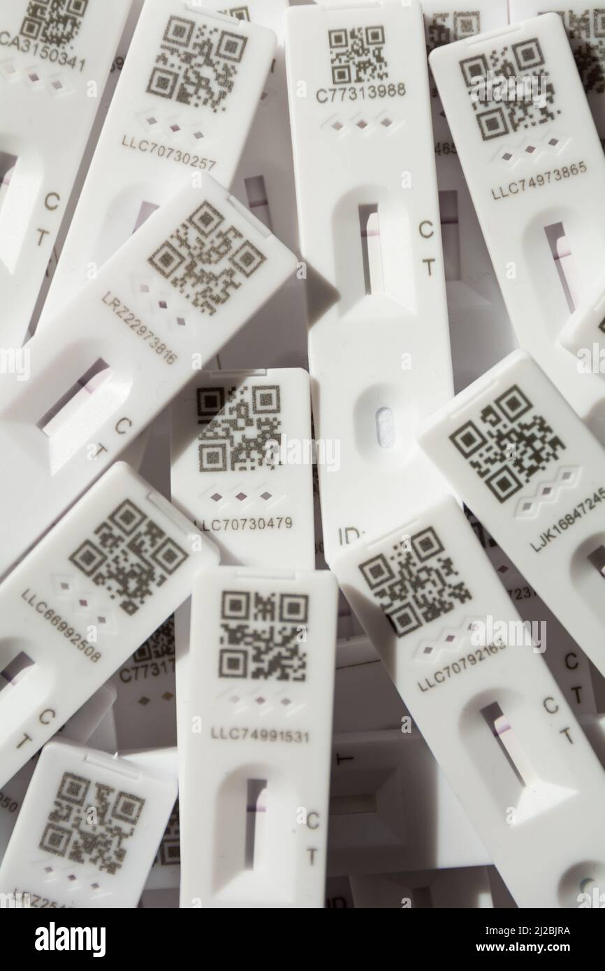 Closeup of plastic Lateral Flow Test Kit kits and QR codes Stock Photo