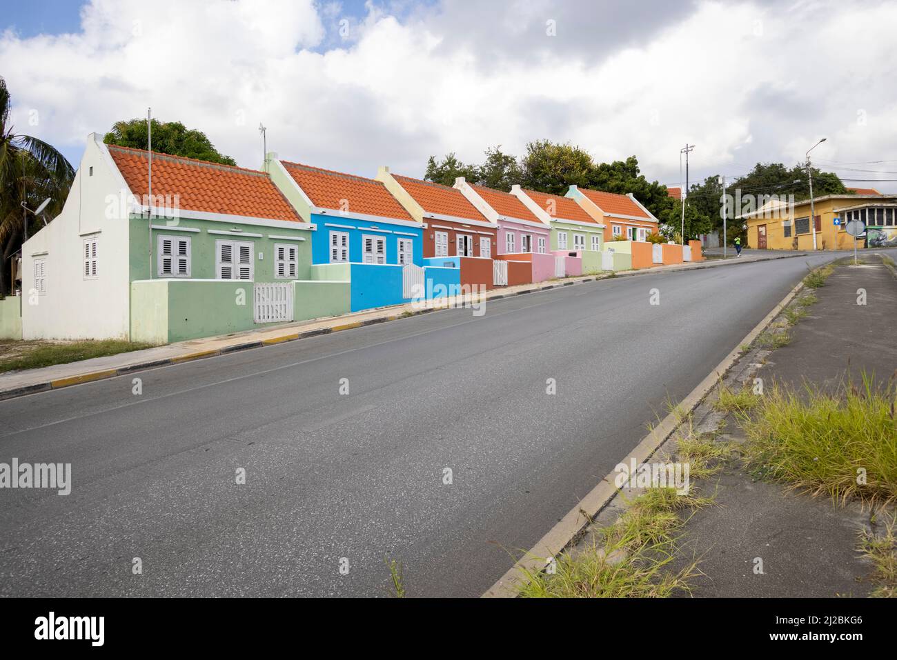 Small colorful houses along the road somewhere in Willemstad, Curacao