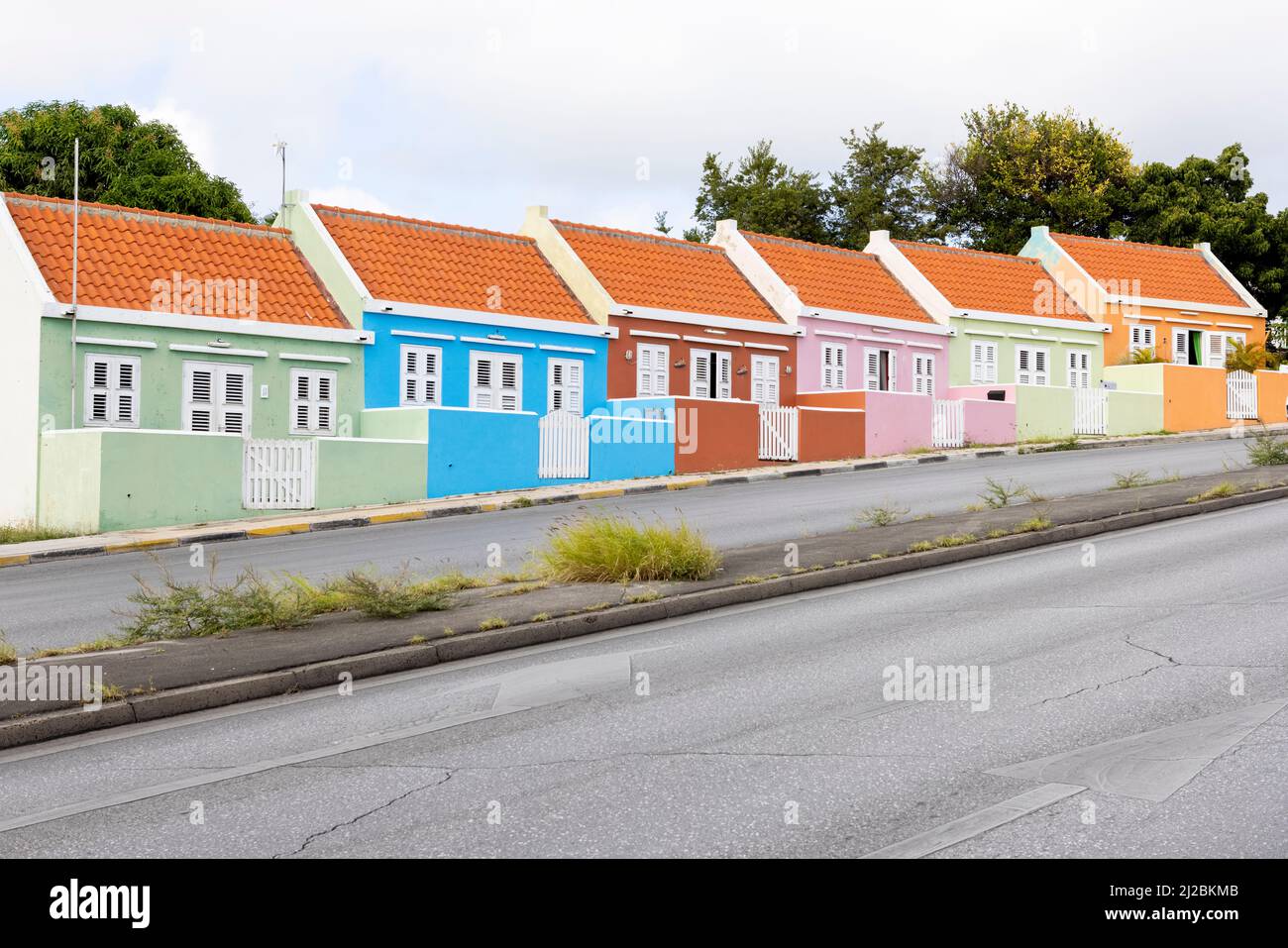 Small colorful houses along the road somewhere in Willemstad, Curacao