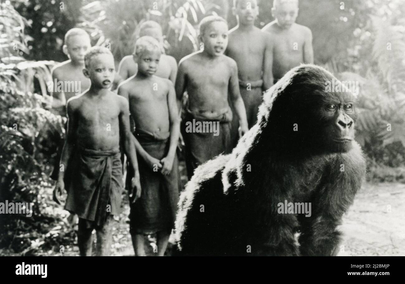 Scene with children and gorilla from the movie Congo, USA 1995 Stock