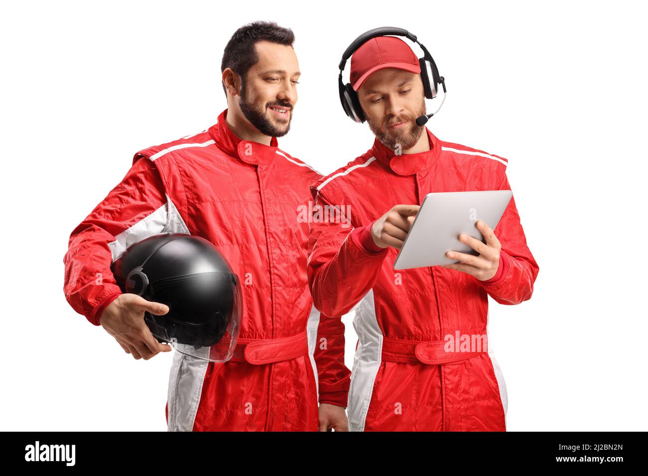 Driver and a team member looking at a tablet isolated on white background Stock Photo