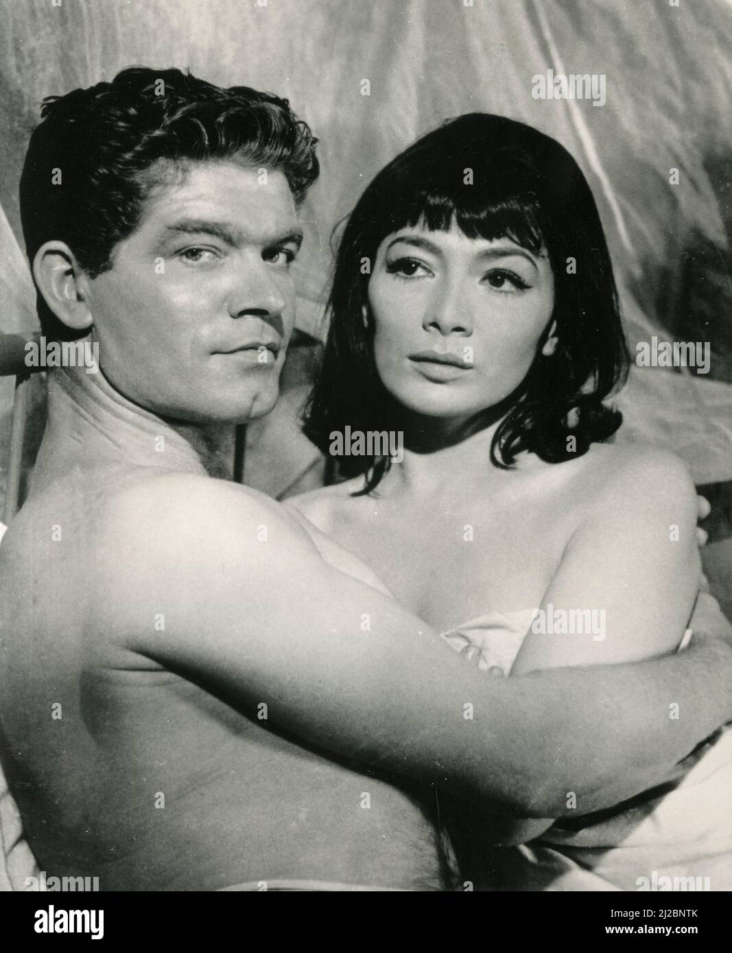French singer and actress Juliette Greco and actor Stephen Boyd in the movie The Big Gamble, USA 1961 Stock Photo