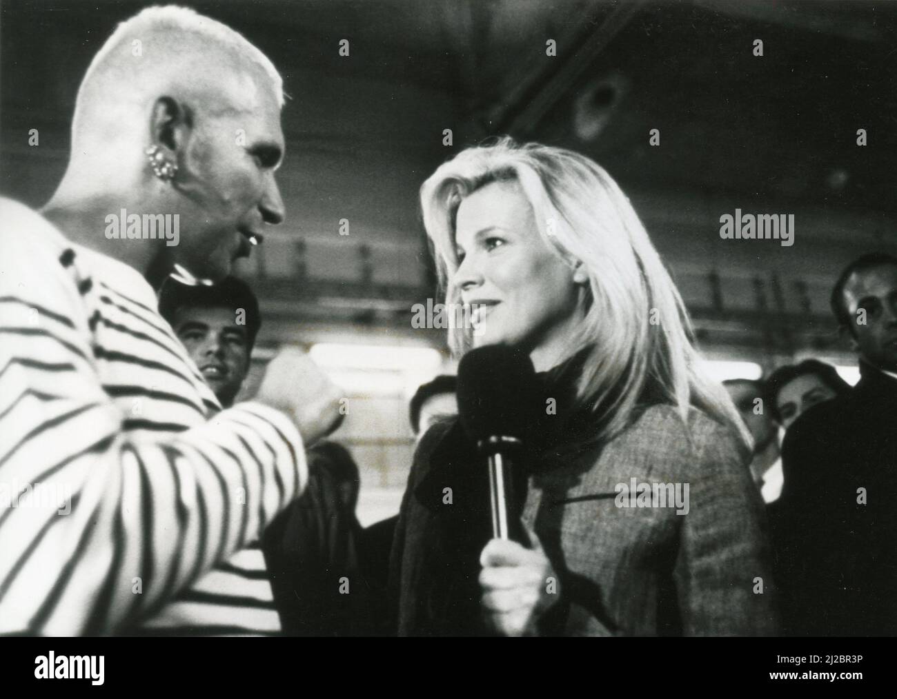 French Fashion designer Jean-Paul Gaultier and actress Kim Basinger in the film Pret-a-Porter, 1994 Stock Photo