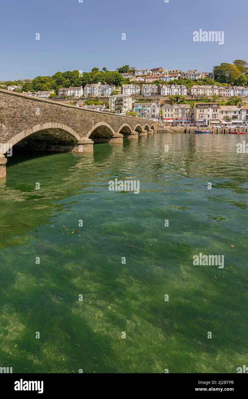The Grade II listed bridge over the East Looe River with hillside