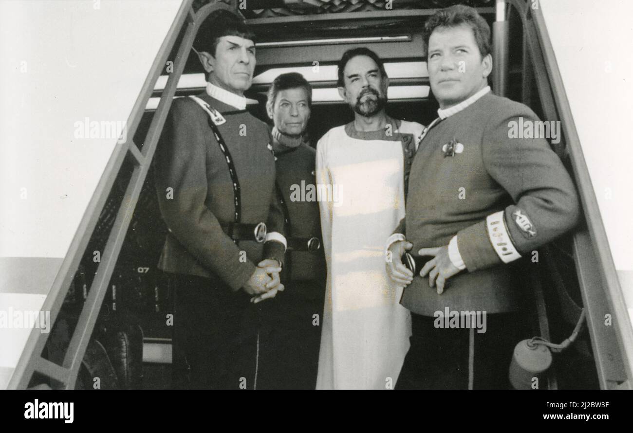 Actors Leonard Nimoy, Laurence Luckinbill, William Shatner, and DeForest Kelly in the film Star Trek V: The Final Frontier, USA 1989 Stock Photo