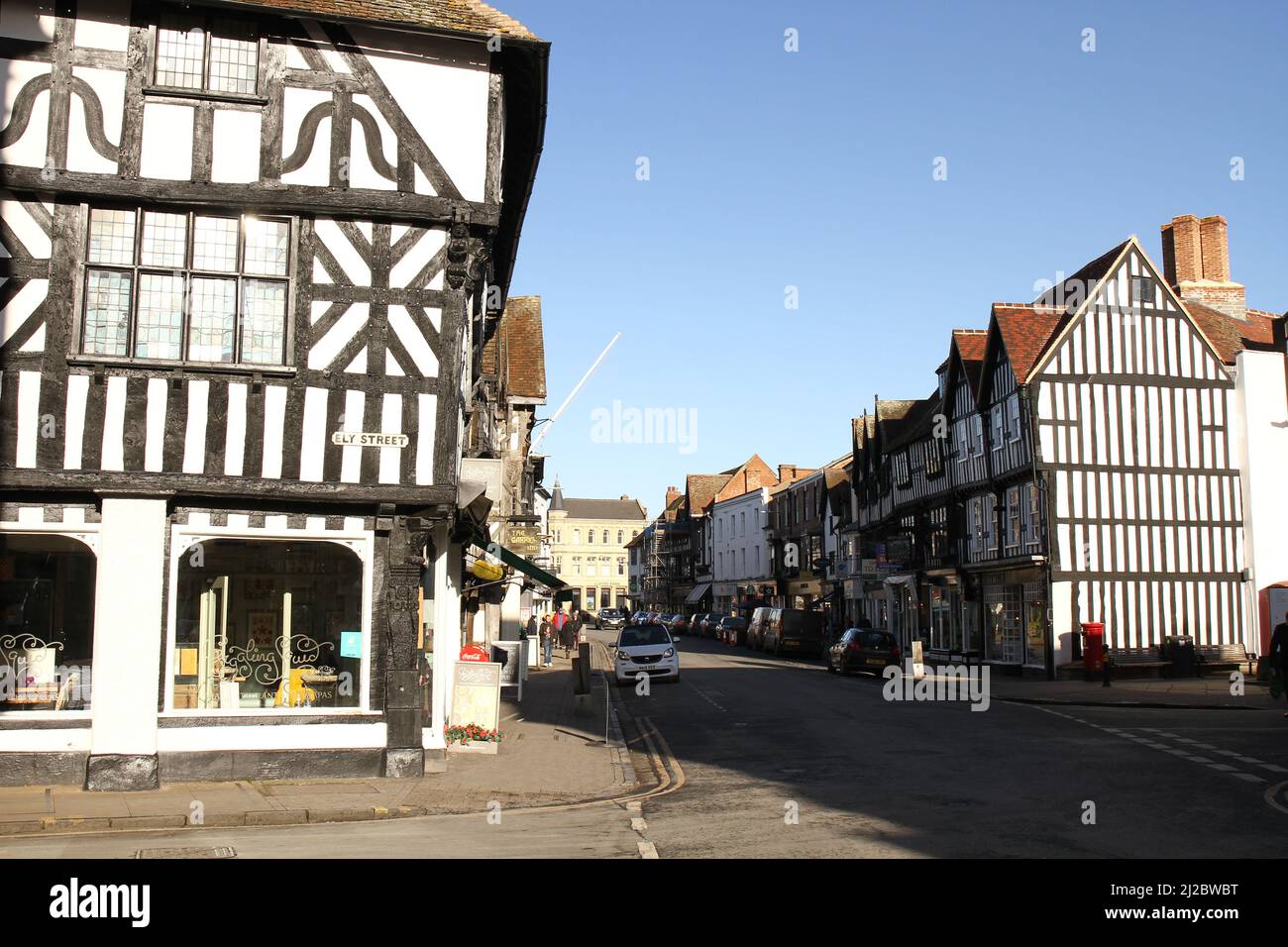 Black and White half timbered Buildings in the High Street, on a blue sky winter's day. Stratford Upon Avon, Warwickshire UK. Stock Photo