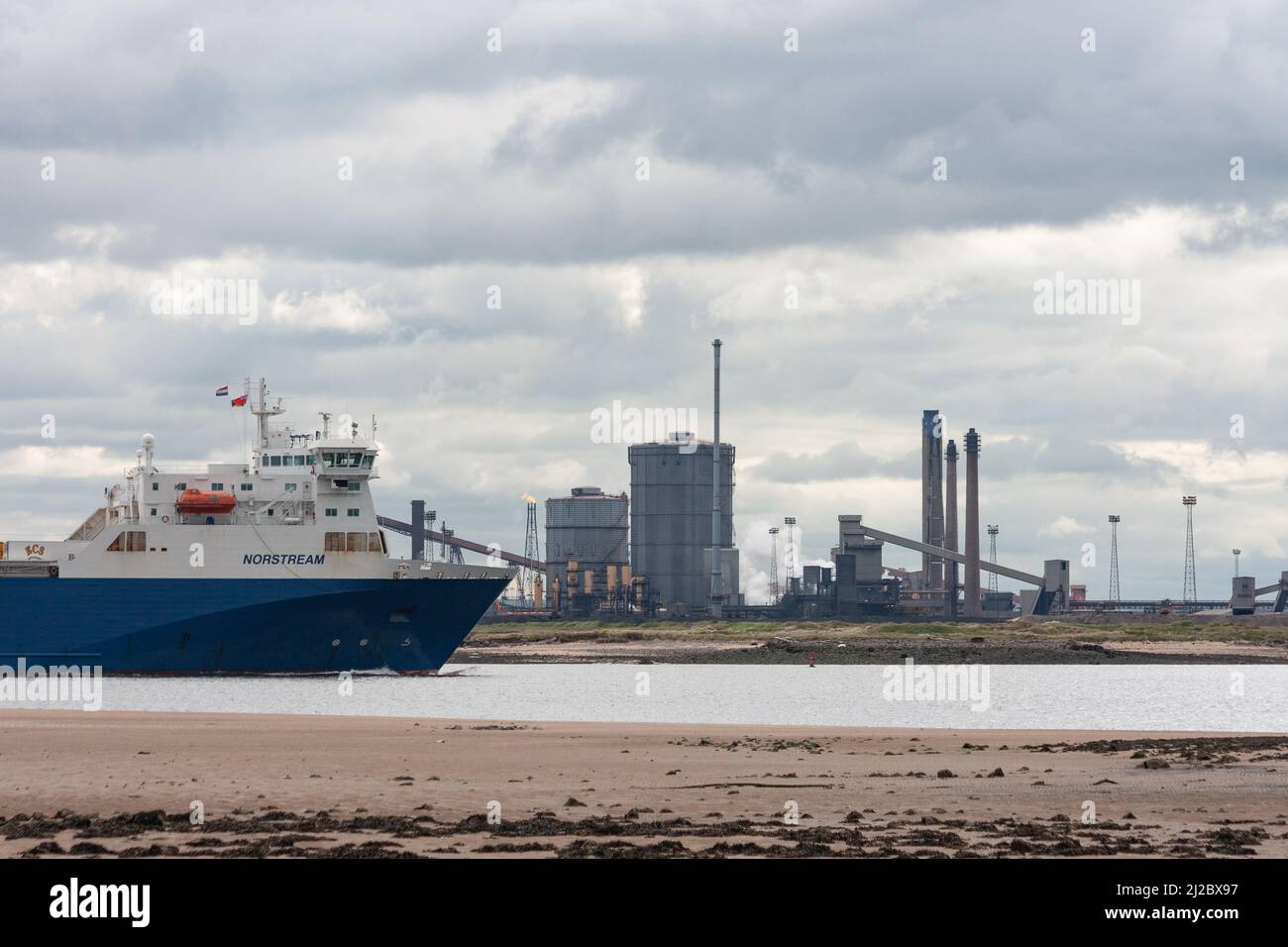 View from North Gare beach near Seaton Carew with Redcar steelworks on the south side of the Tess estuary in background. England. UK Stock Photo