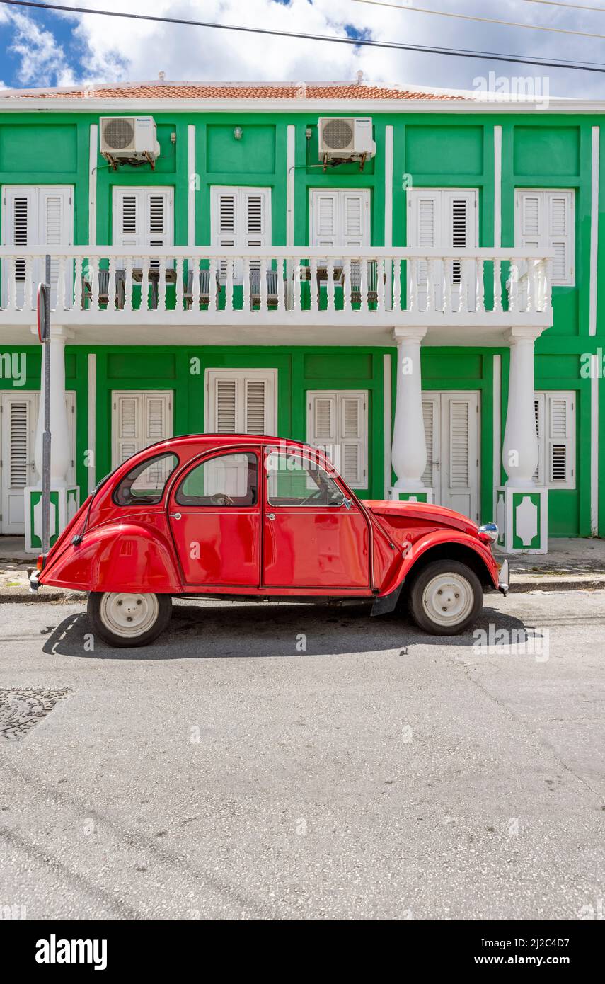 Shiny red Citroën 2CV in the streets of Willemstad, Curacao Stock Photo