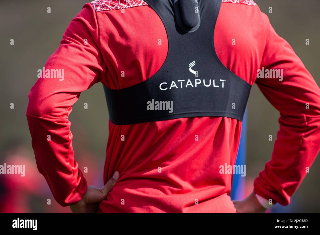 Professional footballer wearing Catapult smart vest Stock Photo