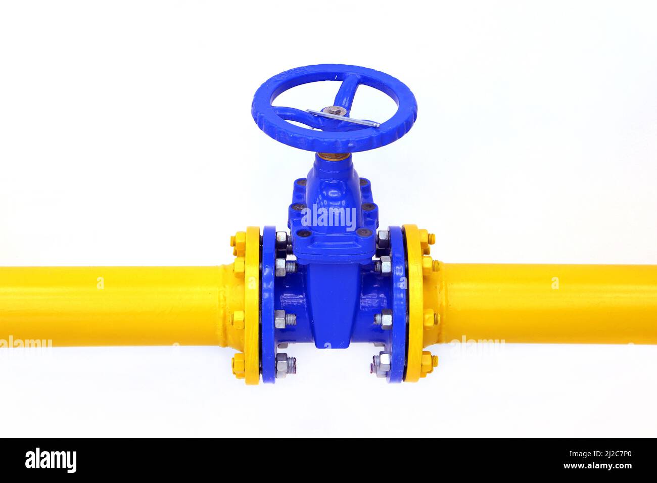 Pipeline with valve on white background. Yellow tube with blue crane, oil and gas industry Stock Photo