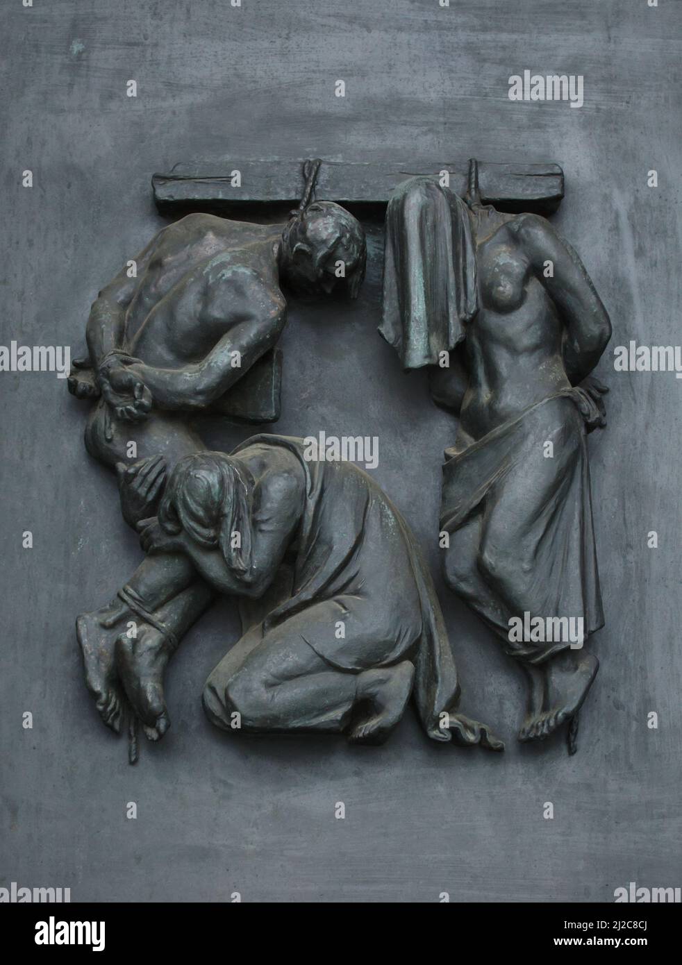 Slovak people executed by the Nazis during World War II depicted in the bronze relief by Slovak sculptor Rudolf Pribiš placed on the main door to the Slavín Memorial in Bratislava, Slovakia. The war memorial devoted to Red Army soldiers fallen during World War II was designed by Slovak architect Ján Svetlík and build between 1957 and 1960. Stock Photo