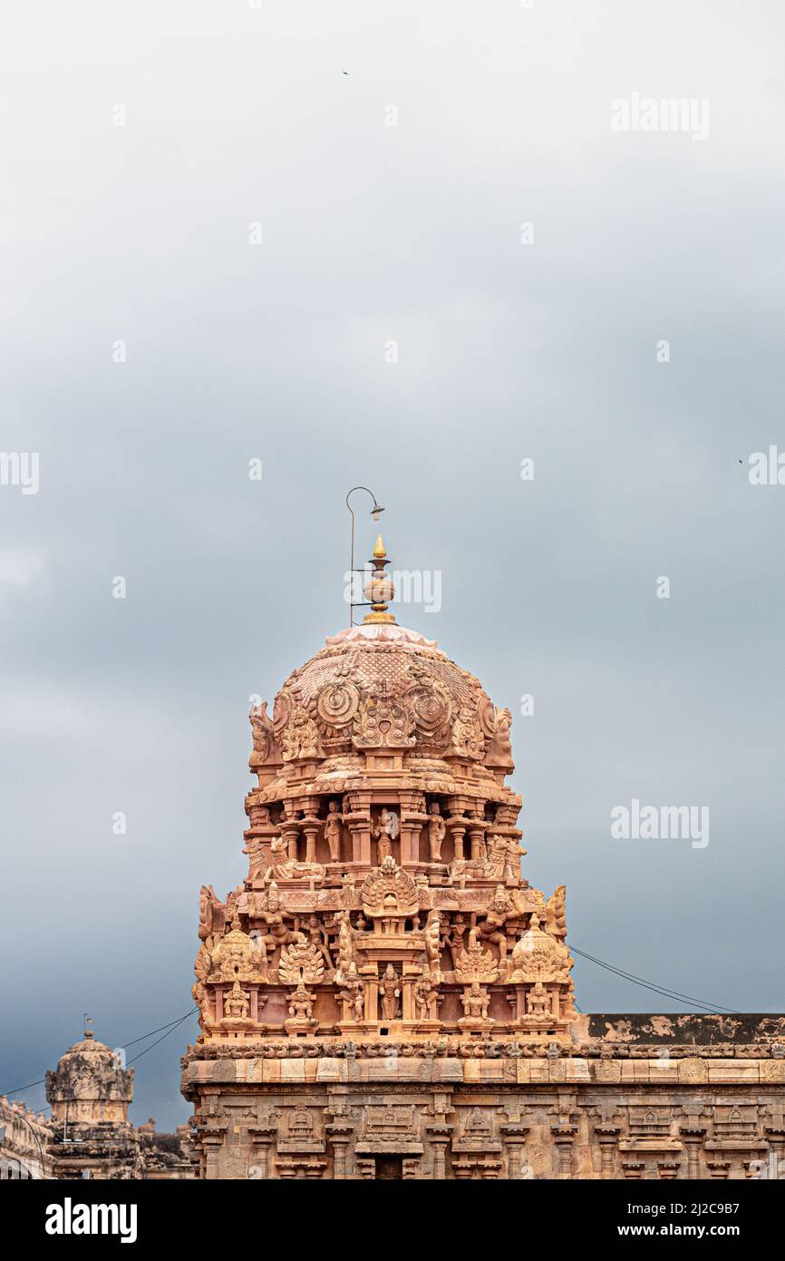 A vertical shot of the dome of Thanjavur Periya Kovil under a gloomy