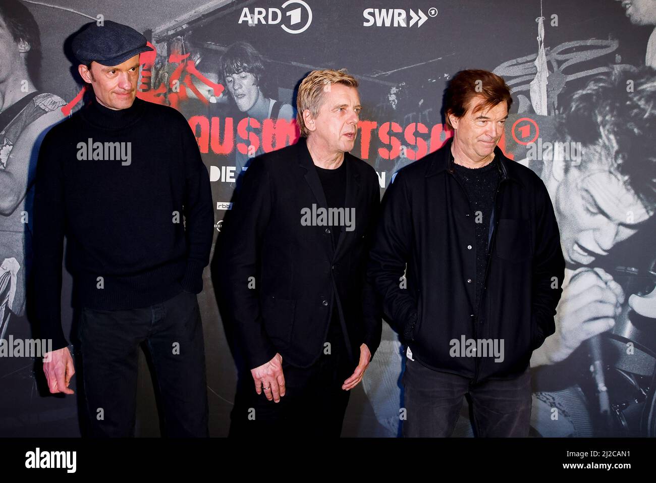 Berlin, Germany. 31st Mar, 2022. Breiti - Michael Breitkopf (l-r), Andi -  Andreas Meurer, Campino - Andreas Frege, before the start of the preview of  the documentary 