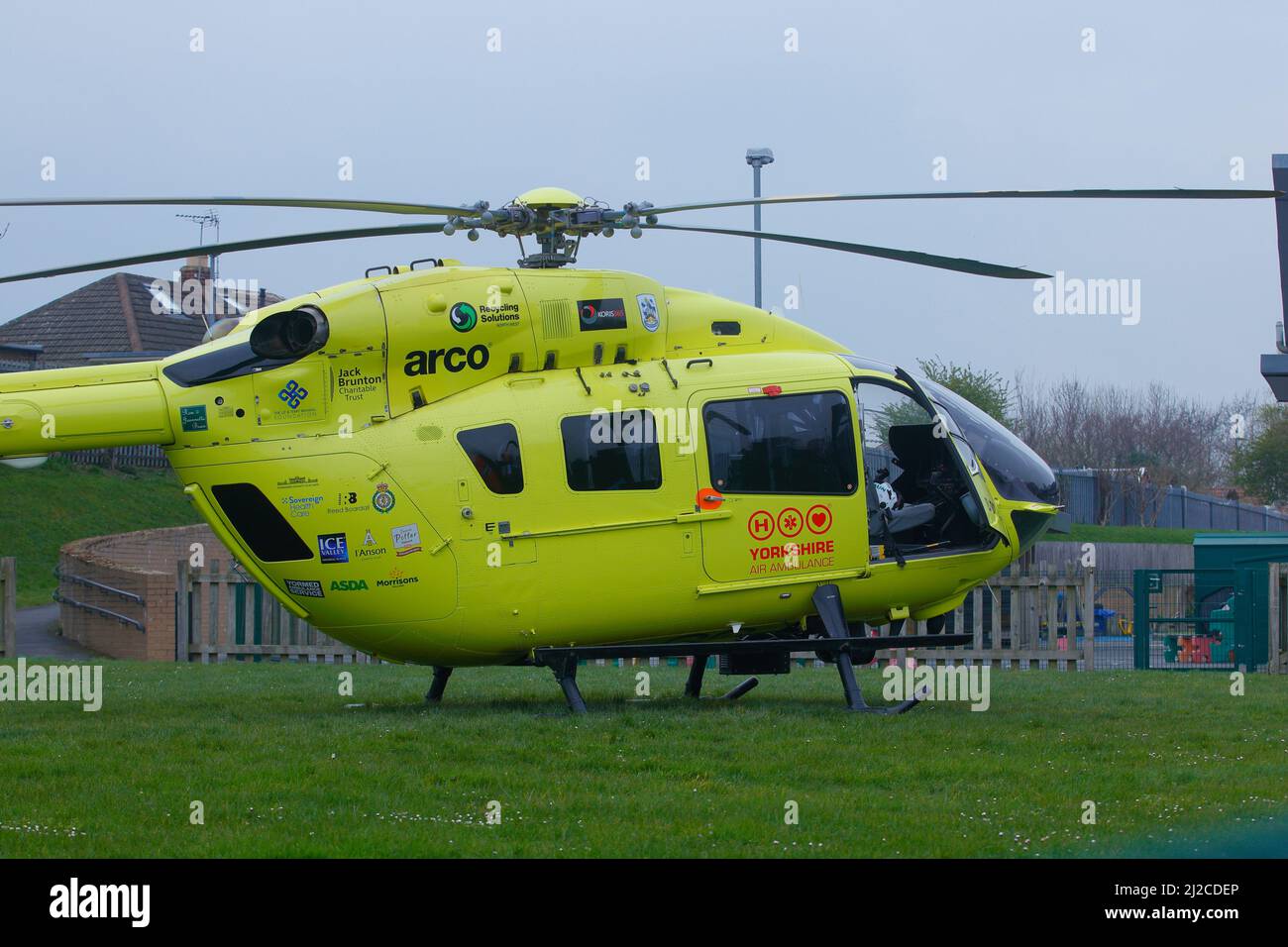 The Yorkshire Air Ambulance seen on the ground at Swillington Primary School in Leeds,Wes tYorkshire,UK Stock Photo