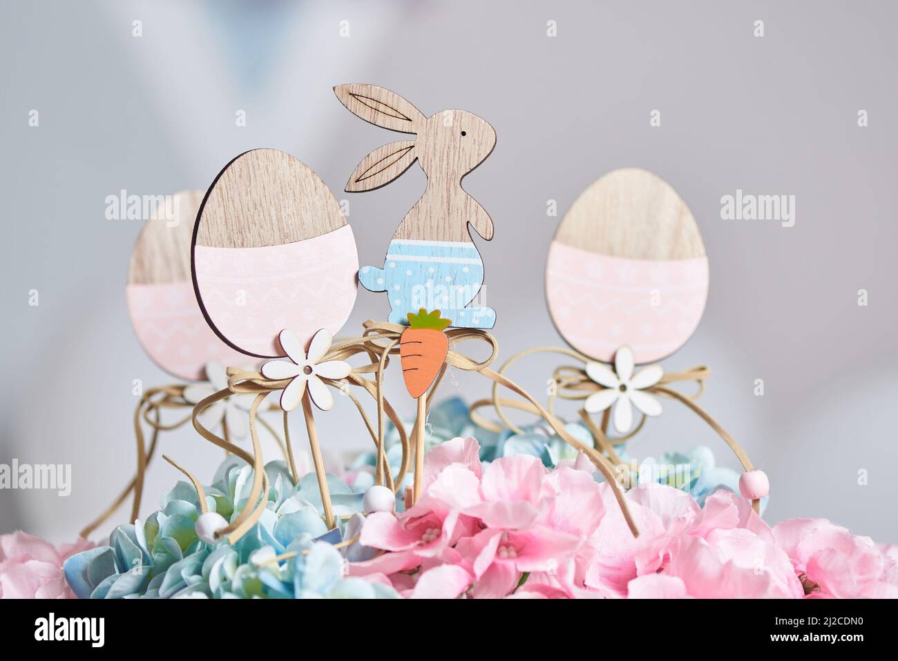 Wooden hare and eggs for Easter decoration Stock Photo