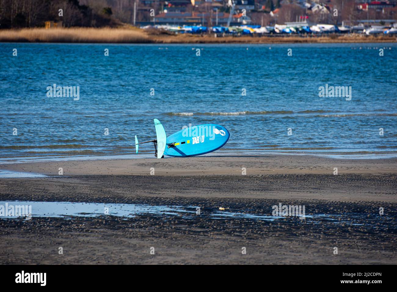 Gothenburg, Sweden - March 13 2022: Blue Tabou foiling board on a beach Stock Photo