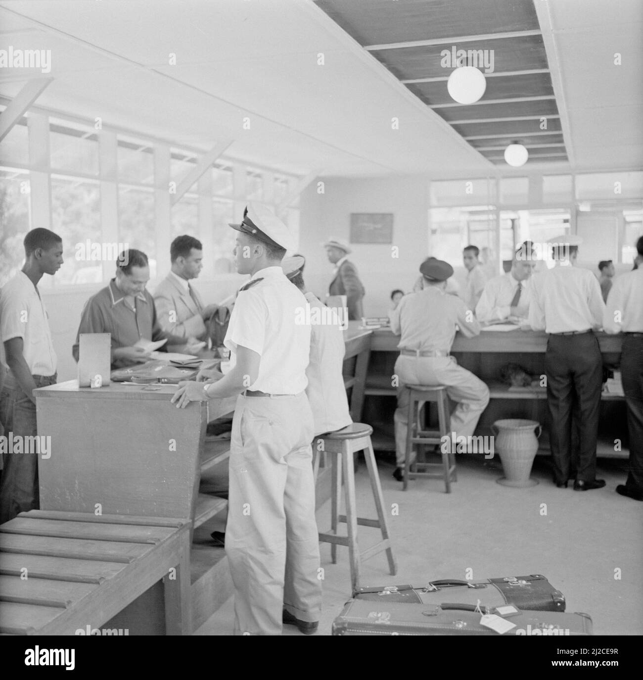 Customs at Zanderij airport in Suriname around October 1, 1955 Stock Photo