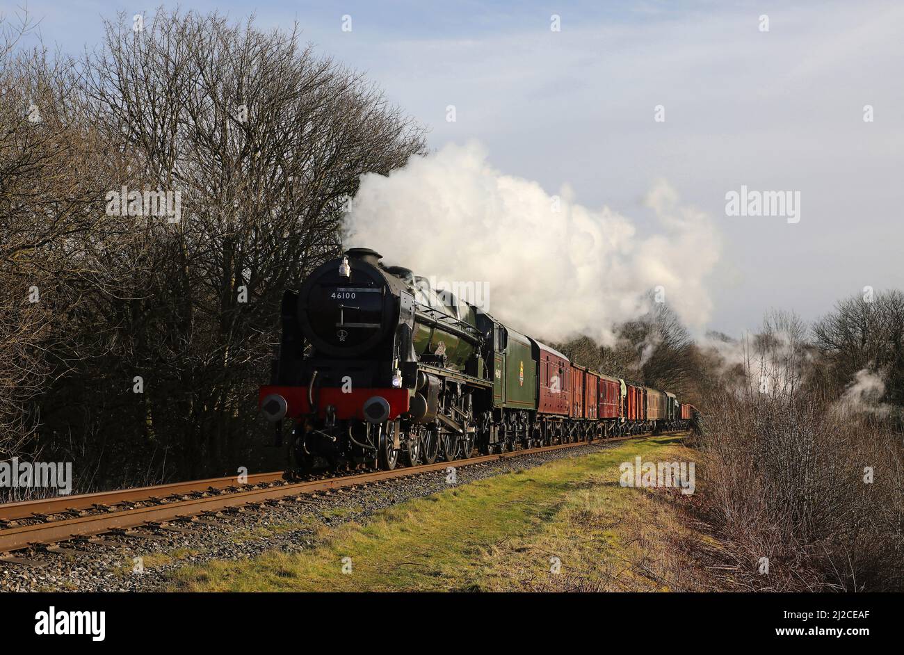 46100 heads through Burrs on the East Lancs Railway on 1.3.22 with a FXP. Stock Photo