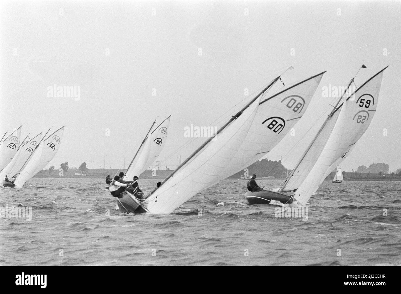 Dutch Championship Sailing, Regenboogklasse on Alkmaardermeer, number 59, Jan Metselaar ca. 10 July 1976 Stock Photo