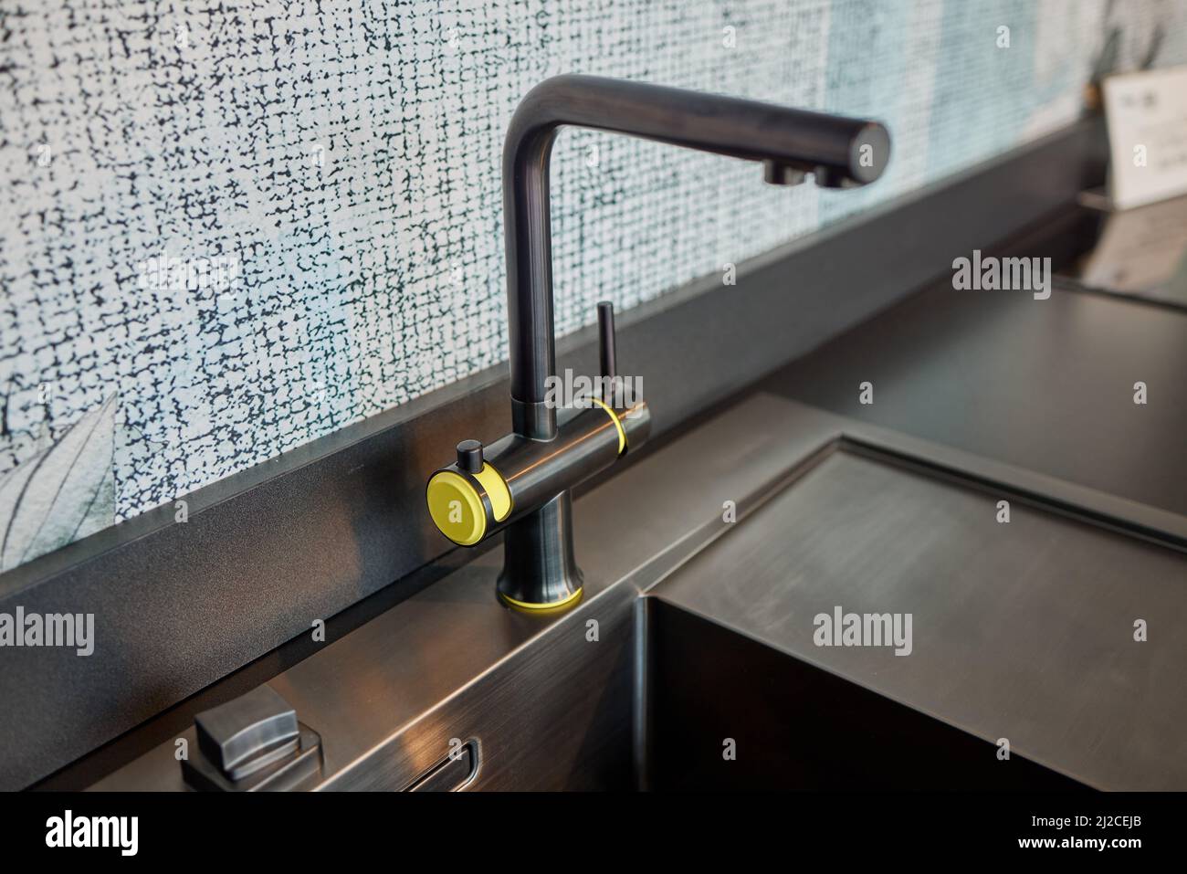 Kitchen water mixer. Water tap made of chrome material Stock Photo Alamy