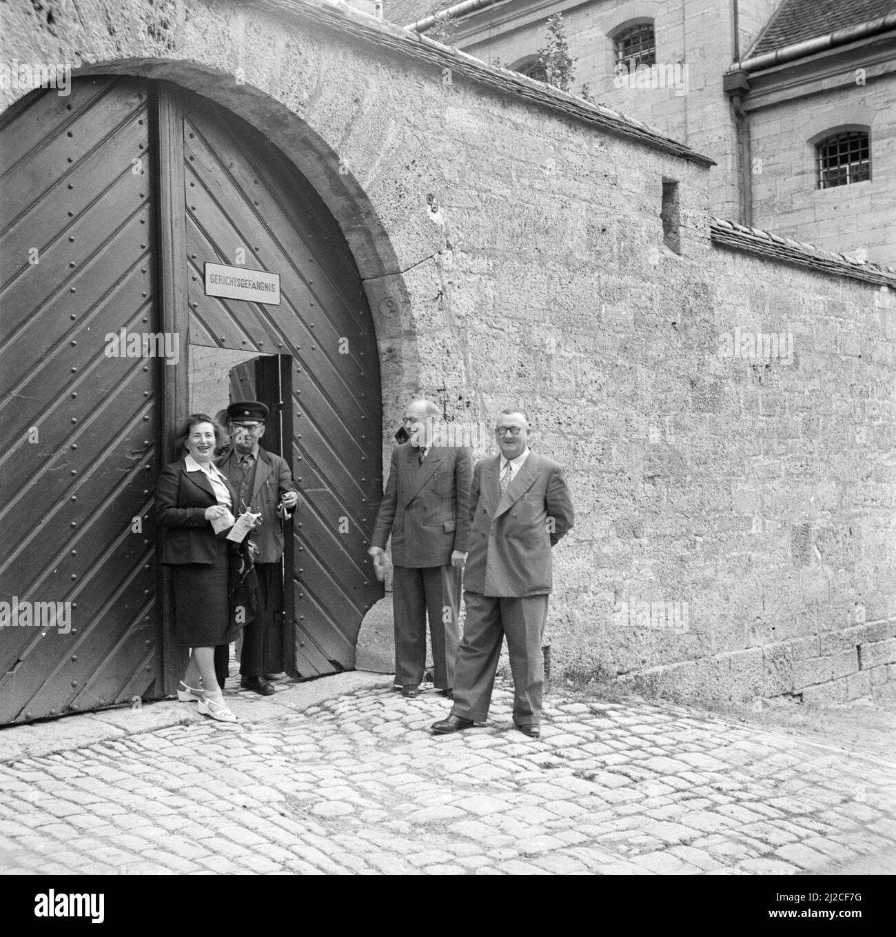 Hilde Eschen poses at the gate of the Kriminalmuseum  ca: September 1953 Stock Photo