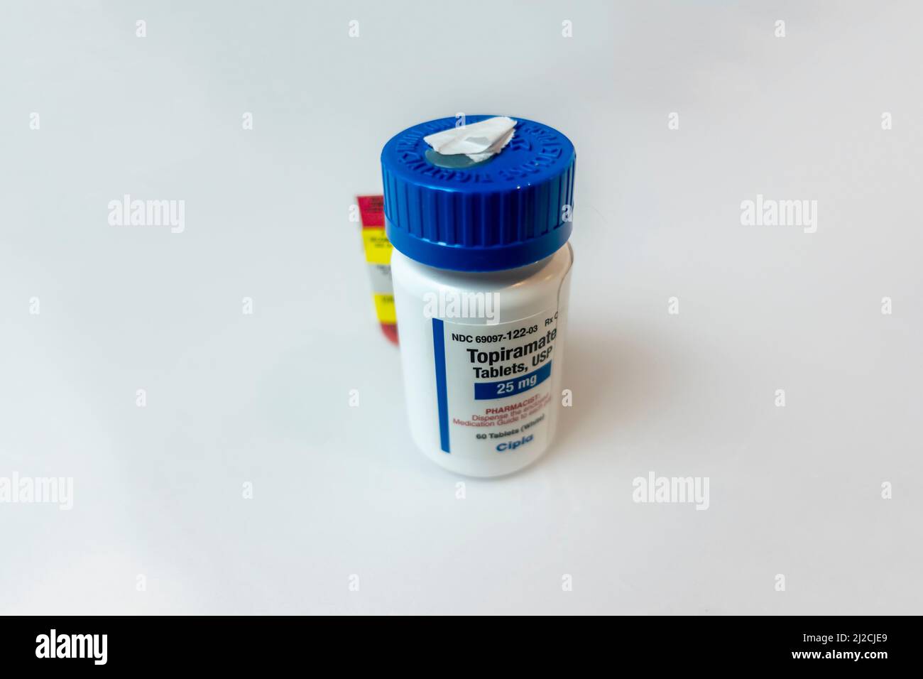 Seattle, WA USA - circa December 2021: view of a prescription bottle of Topiramate on a white background. Stock Photo