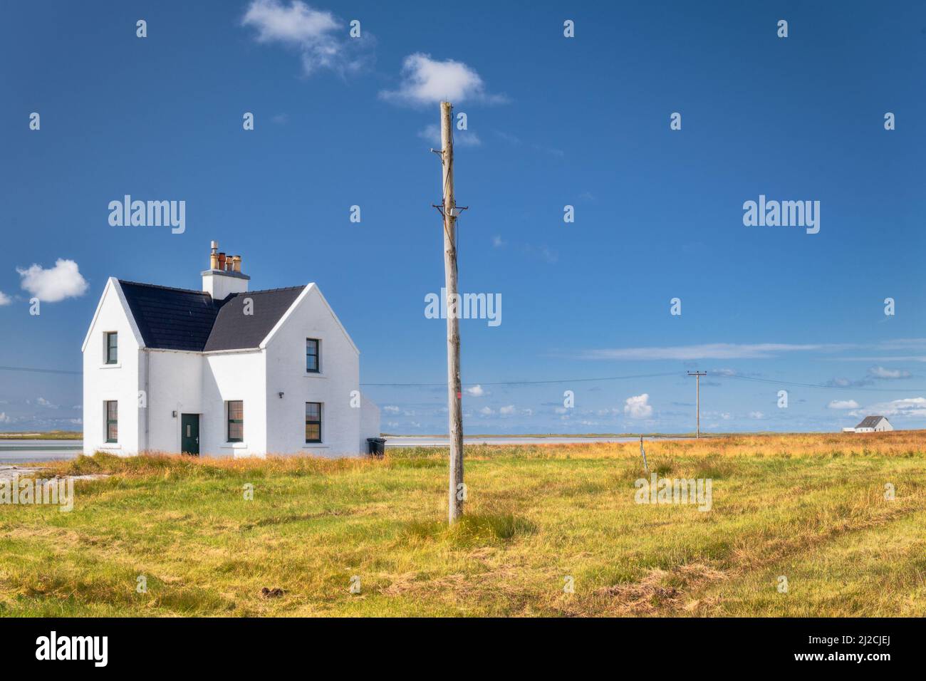 Alone white house in the countryside of Scotland with sunny day, Scotland Stock Photo