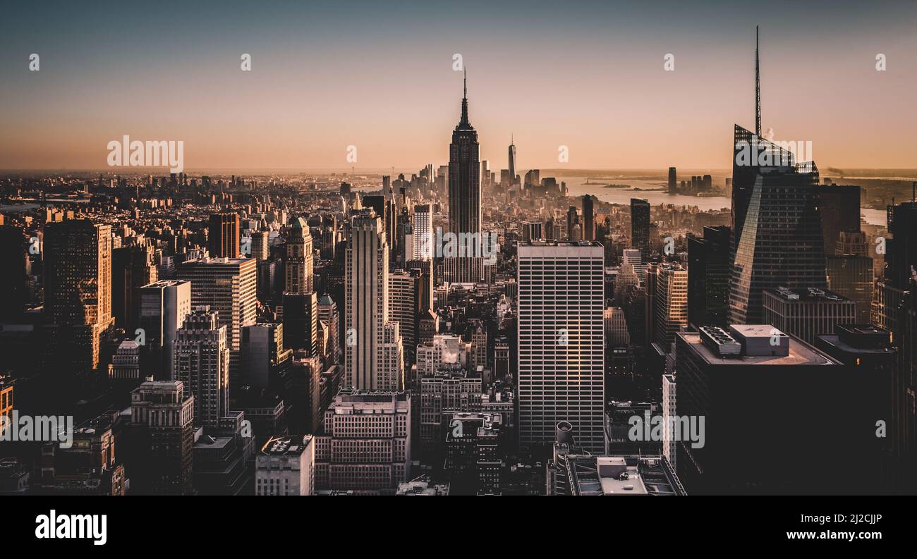 New York City Manhattan downtown skyline at sunset Stock Photo - Alamy