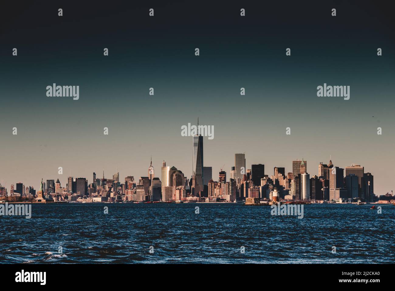 New York City Manhattan downtown skyline at dusk with skyscrapers ...