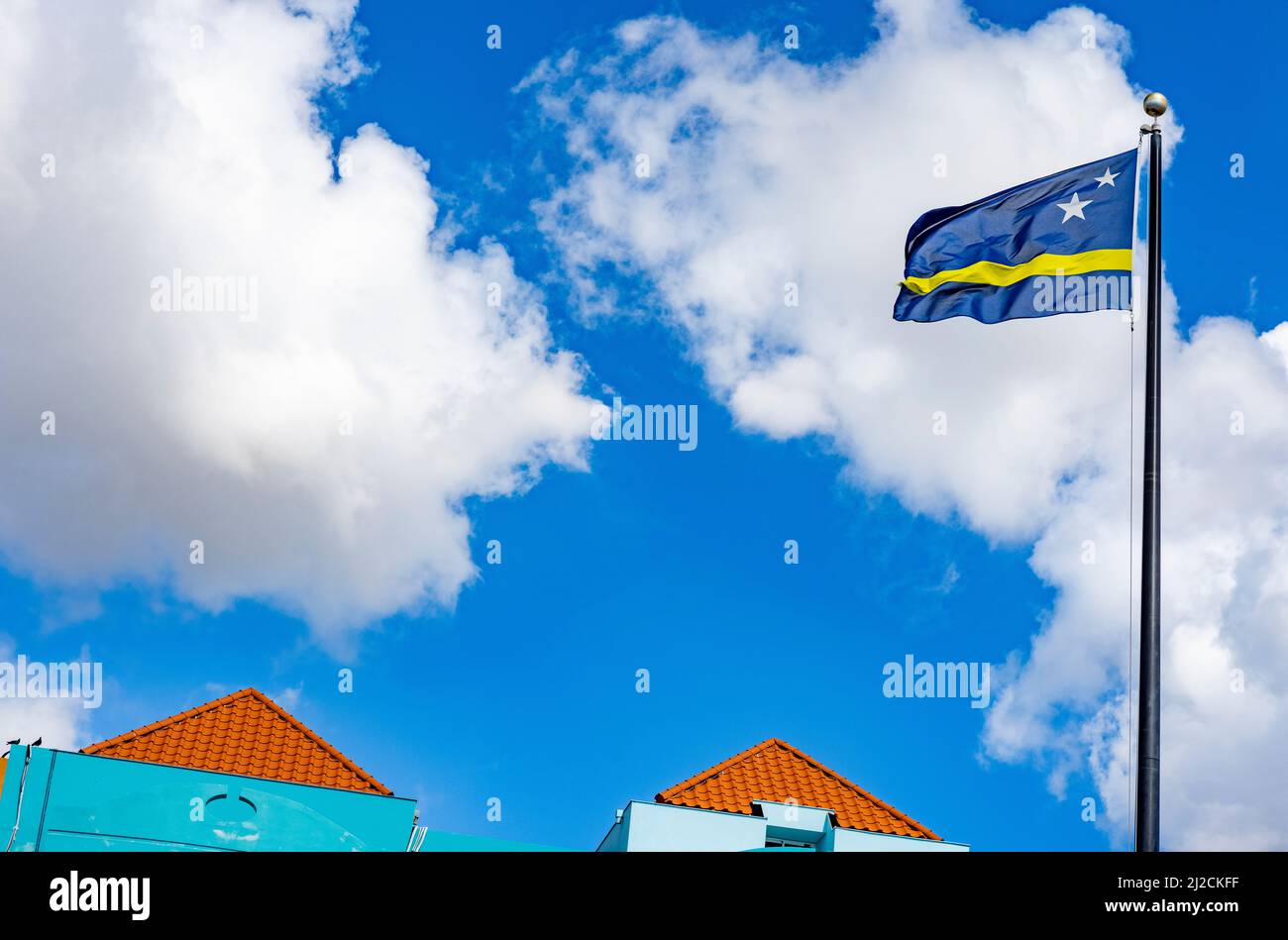 Flag of Curacao waving at the city center of Willemstad, Curacao Stock Photo