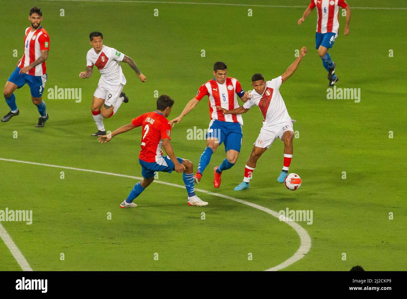 Lima, Peru. 29th Mar, 2022. Player Edison Flores (R), from Peru, is marked by Fabian Balbuena (c) and Robert Rojas (l) from Paraguay during the CONMEBOL Qualifiers for the FIFA World Cup Qatar 2022 match at the National Stadium, in Lima (Credit Image: © Mariana Bazo/ZUMA Press Wire) Stock Photo