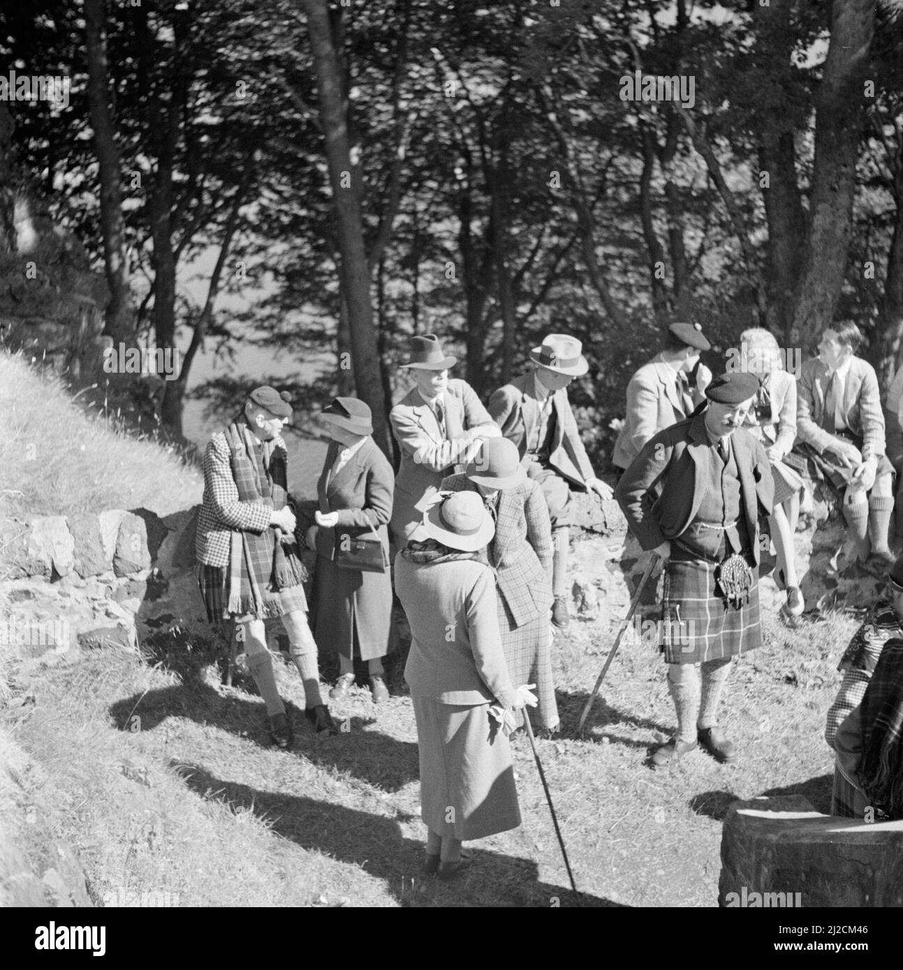 Spectators at the Highland Games, a nineteenth century continuation of traditional clan games from the highlands of Scotland ca: 1934 Stock Photo