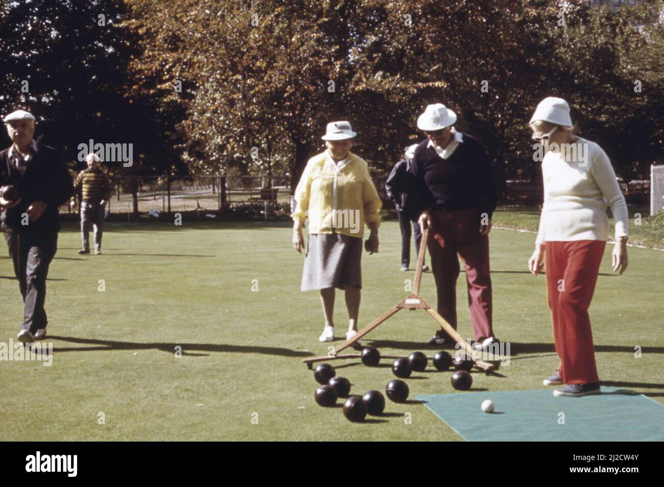 Members of the Bowling Green Bowling Club meet for a game in Central Park  ca.  1973 Stock Photo