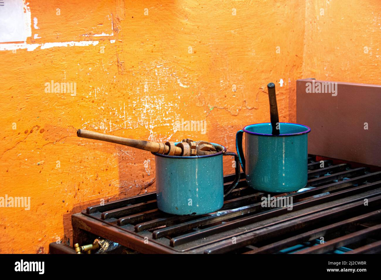 Two blue-green cooking pots on a stove. San Miguel de Allende, Guanajuato, Mexico. Stock Photo