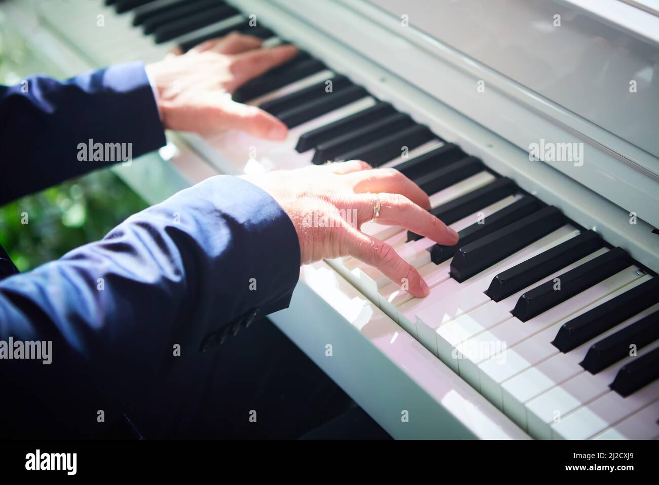 Closeup hand man playing piano. Classical music instrument. Fade color ...