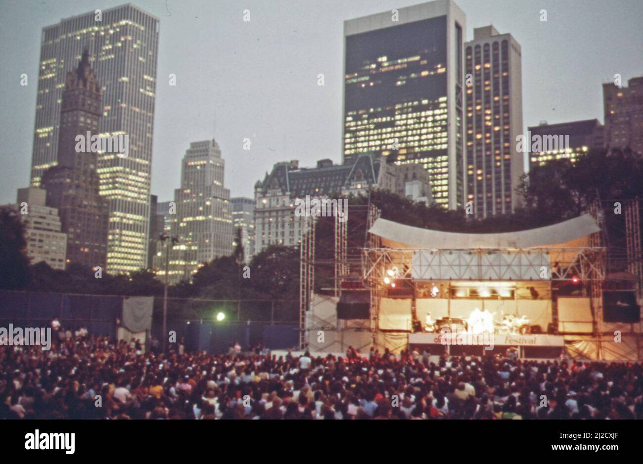 The Schaefer Bandstand in Central Park on a clear June evening. Lights