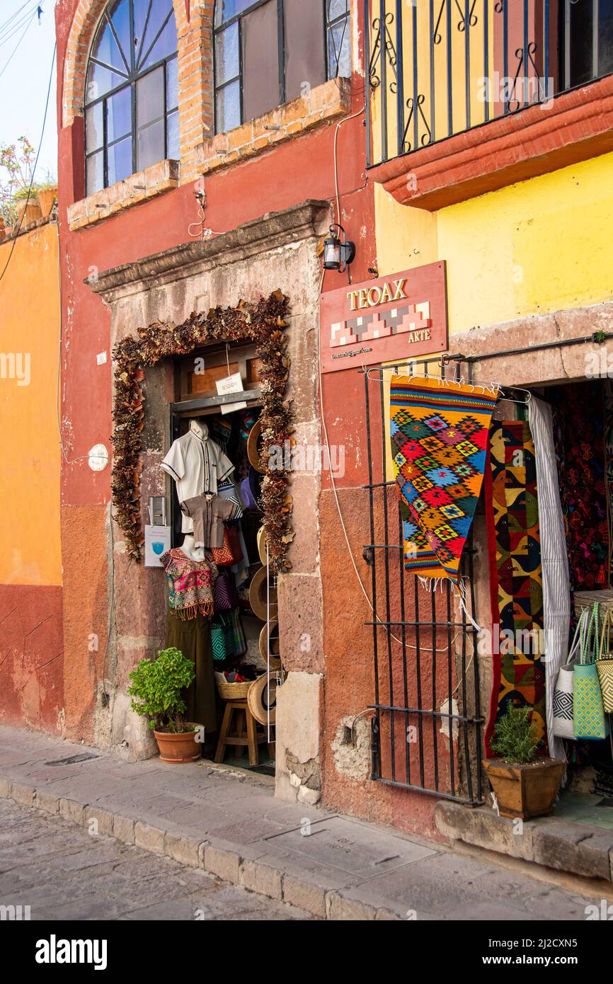 Two stores selling a variety of Mexican folk art and clothing accessories. San Miguel de Allende, Guanajuato, Mexico. Stock Photo