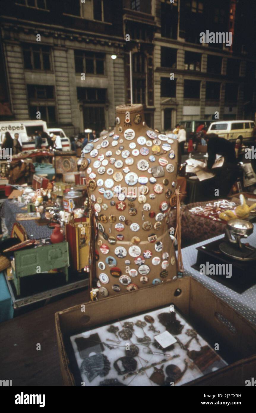 Used campaign buttons cover a dummy at a flea market at Sixth Avenue and 27th Street in lower Manhattan  ca.  1973 Stock Photo